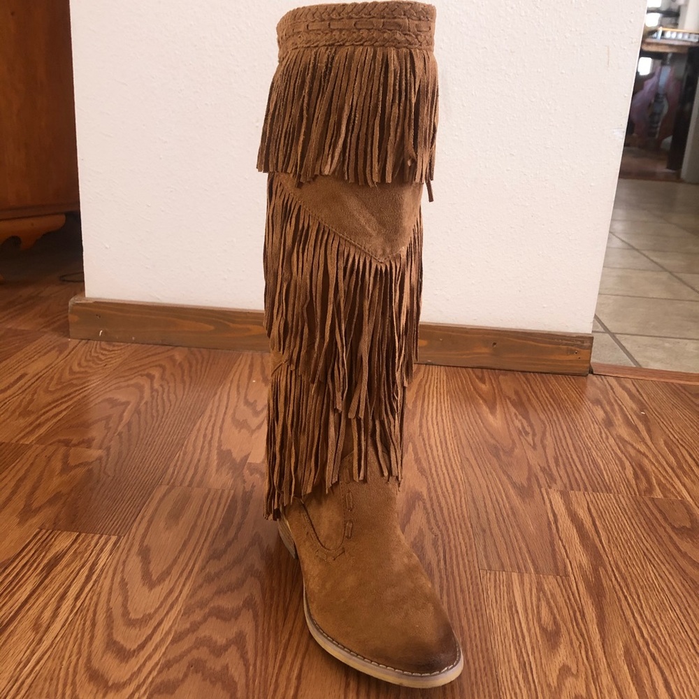 Brown tasseled boots